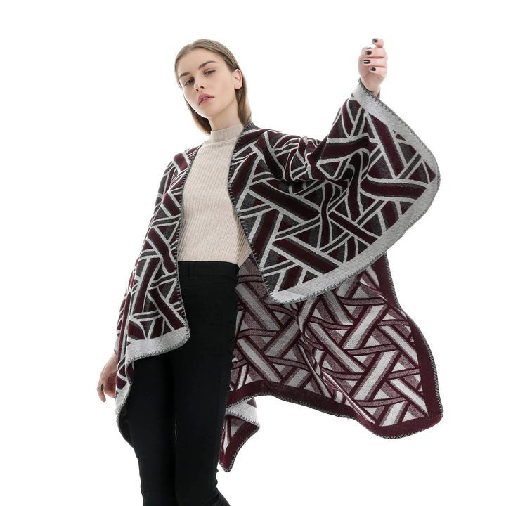 Dam Oversize Ruana med geometric jacquard och decorative seam