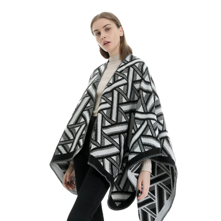Dam Oversize Ruana med geometric jacquard och decorative seam