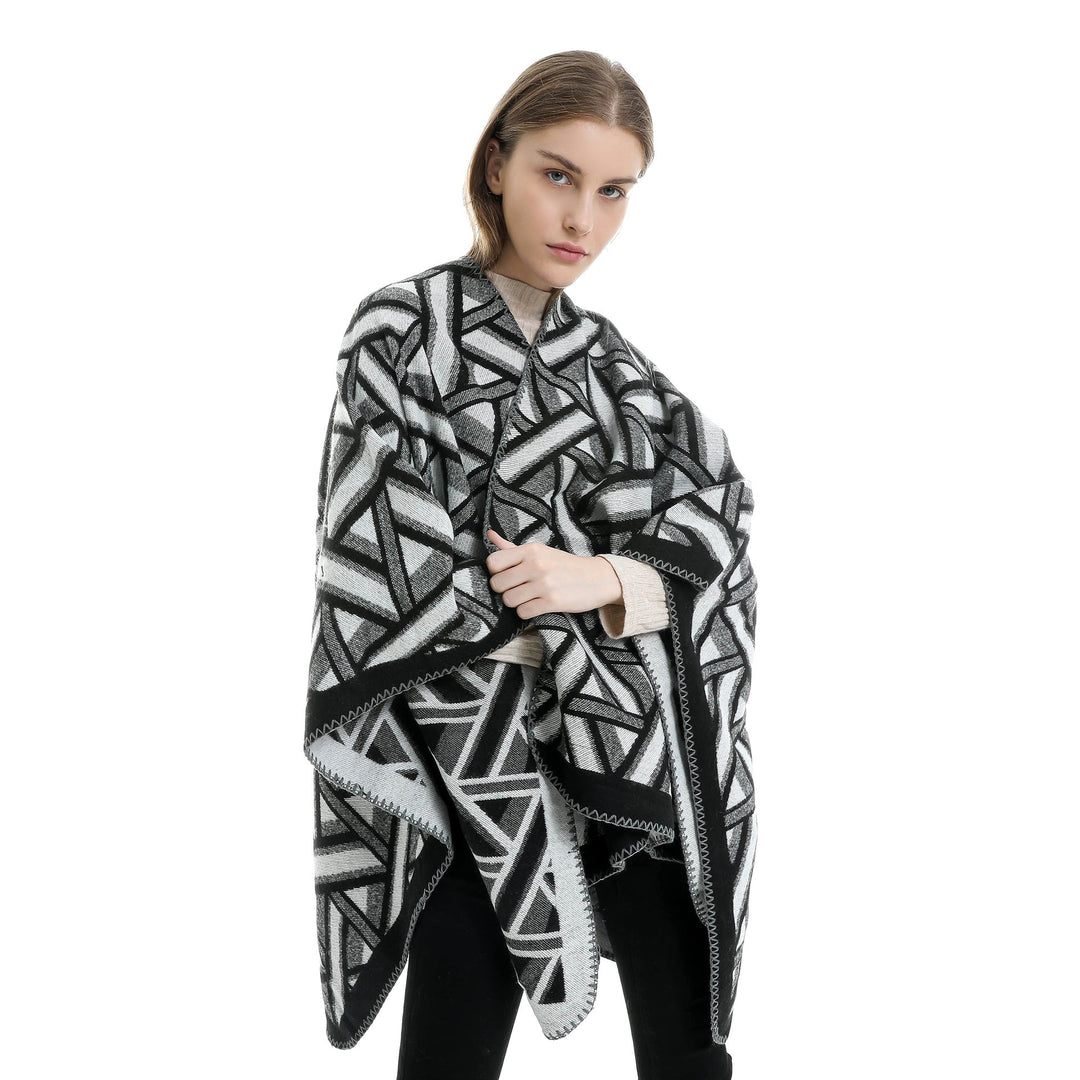 Dam Oversize Ruana med geometric jacquard och decorative seam