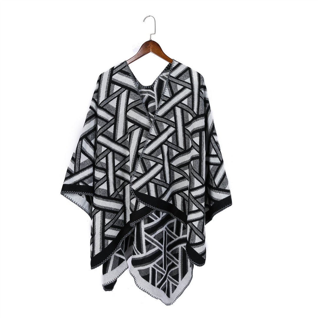 Dam Oversize Ruana med geometric jacquard och decorative seam