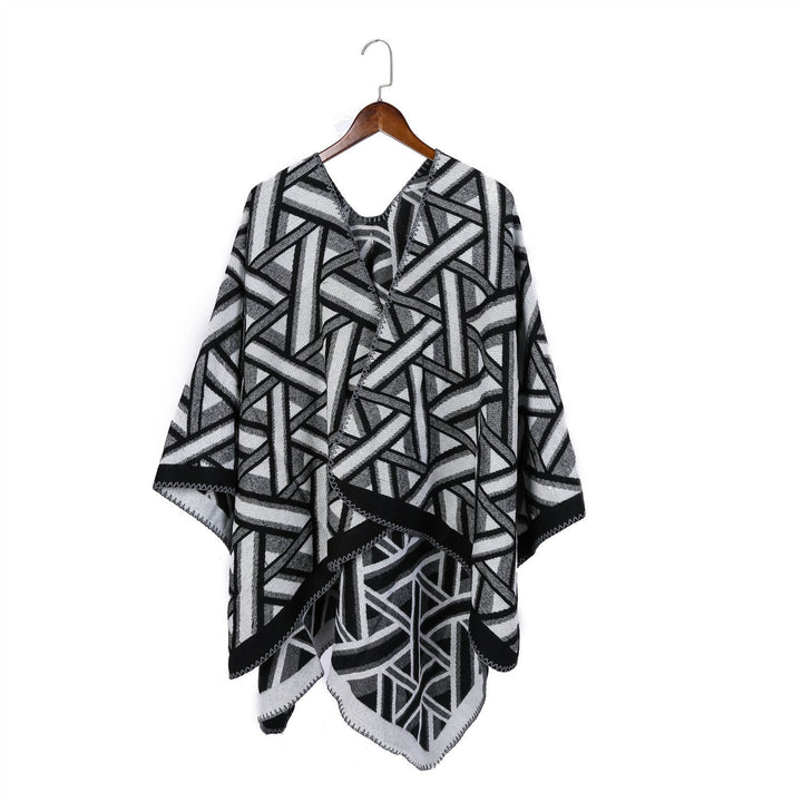 Dam Oversize Ruana med geometric jacquard och decorative seam