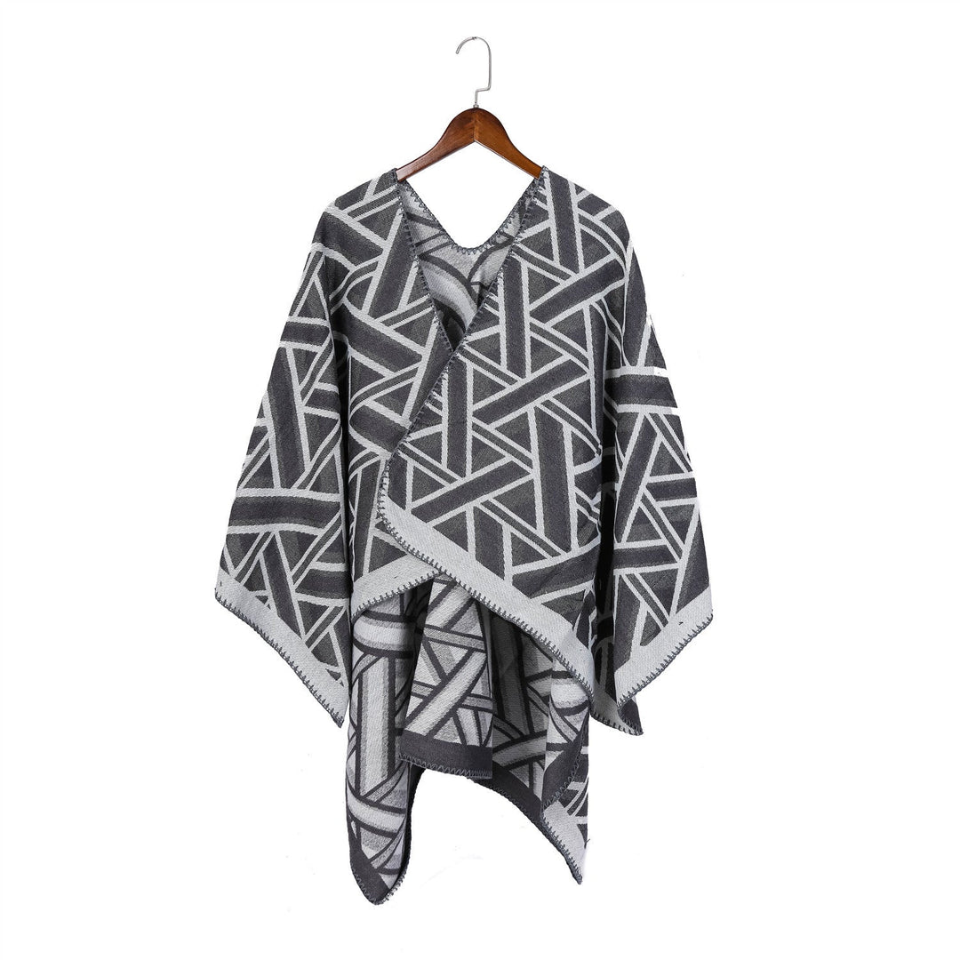 Dam Oversize Ruana med geometric jacquard och decorative seam