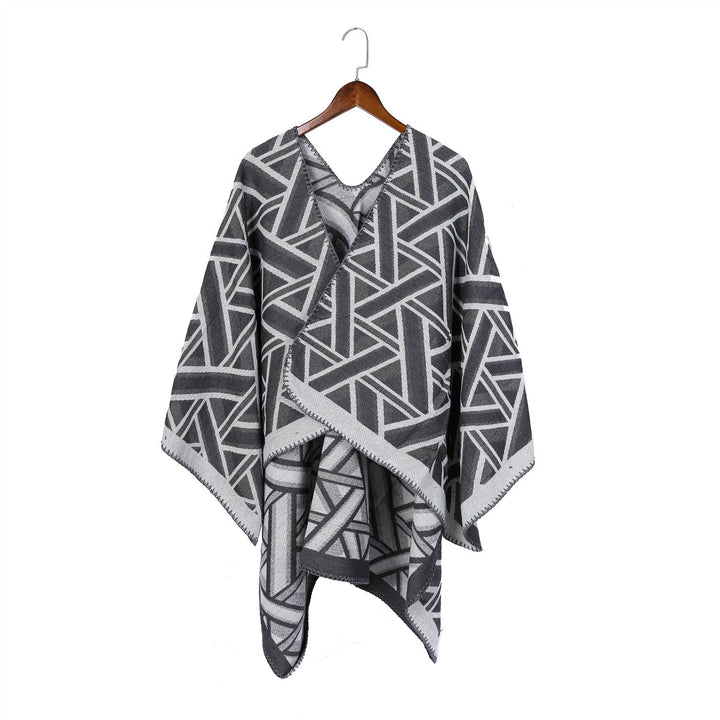 Dam Oversize Ruana med geometric jacquard och decorative seam