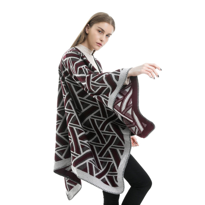 Dam Oversize Ruana med geometric jacquard och decorative seam