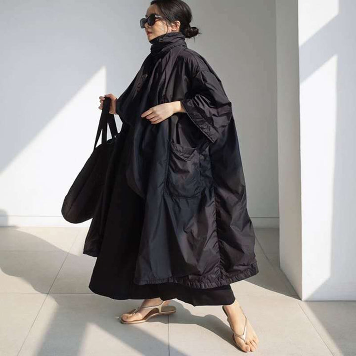 Dam Longline Parka i lätt vindjacka stil med innerfoder, drawstring och flap fickor