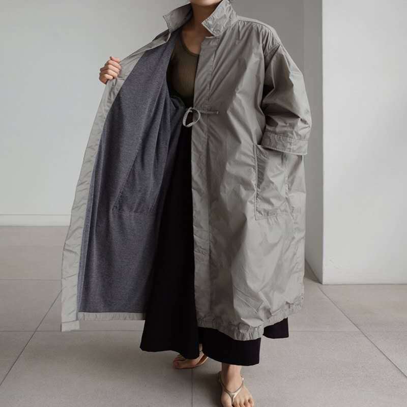 Dam Longline Parka i lätt vindjacka stil med innerfoder, drawstring och flap fickor