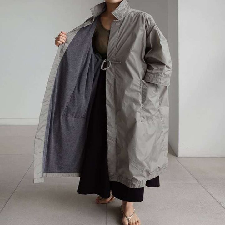 Dam Longline Parka i lätt vindjacka stil med innerfoder, drawstring och flap fickor