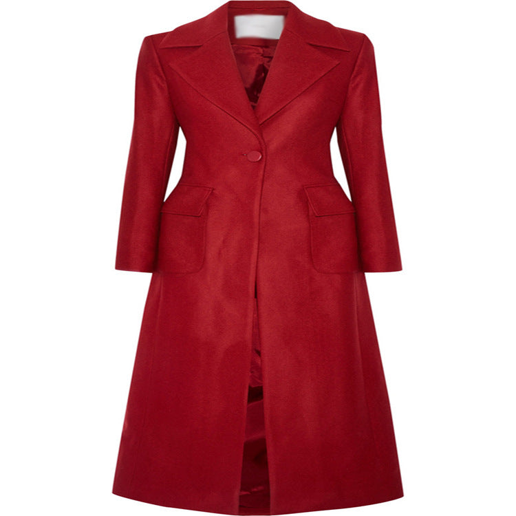 Dam maxi-length ullblandning kappa med skräddad seam design, knife pleats, och flap fickor