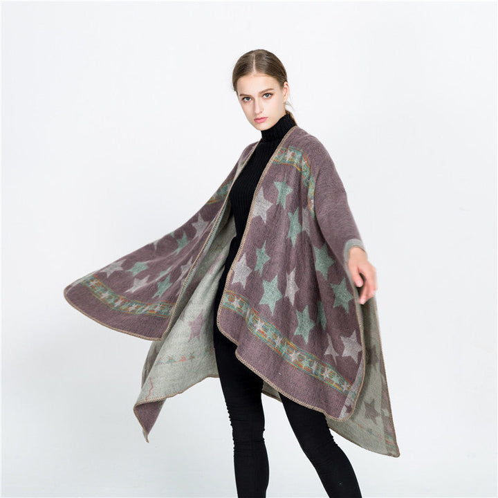 Dam Jacquard Ruana poncho med star jacquard och softly falling oversized silhuett