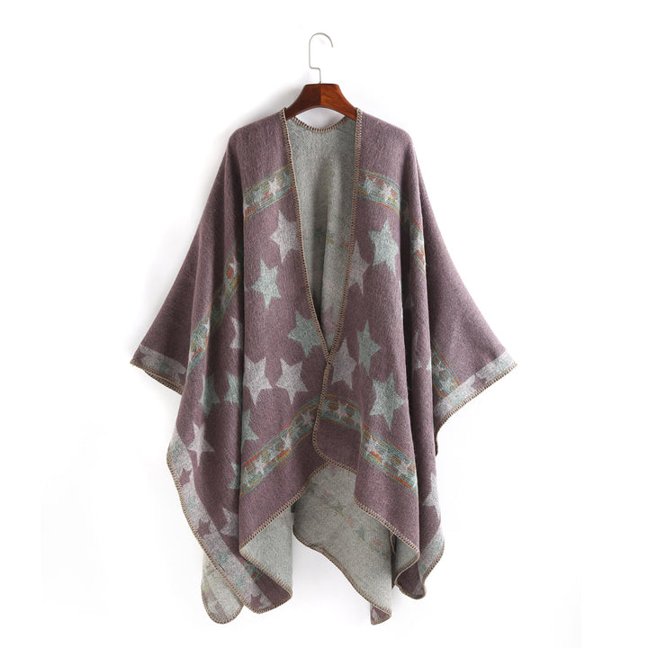 Dam Jacquard Ruana poncho med star jacquard och softly falling oversized silhuett