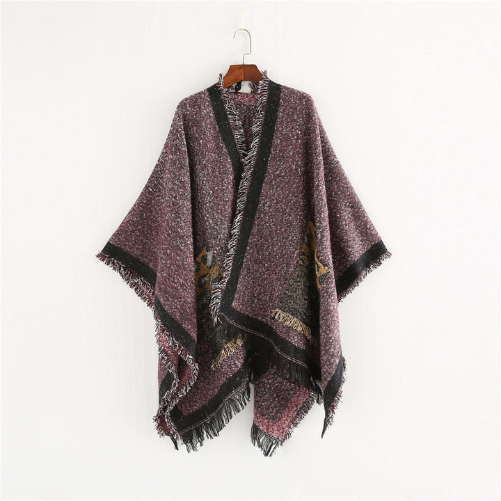 Dam Oversize Ruana poncho i en ullblandning med fringes och kontrasterande edge
