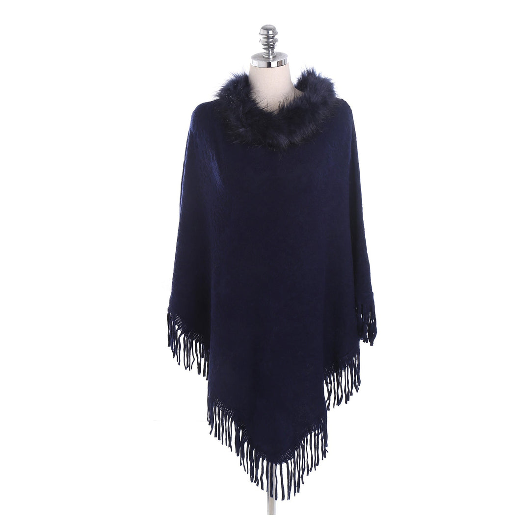 Dam poncho-Ruana med fuskpälskrage, structured jacquard och fransfåll