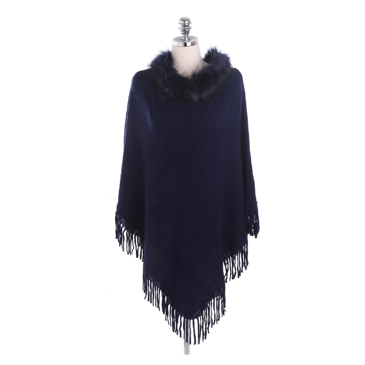 Dam poncho-Ruana med fuskpälskrage, structured jacquard och fransfåll