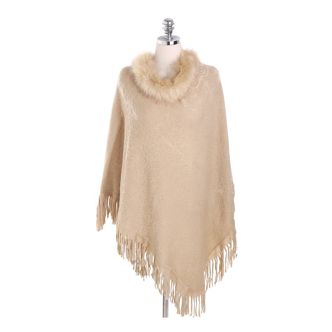 Dam poncho-Ruana med fuskpälskrage, structured jacquard och fransfåll