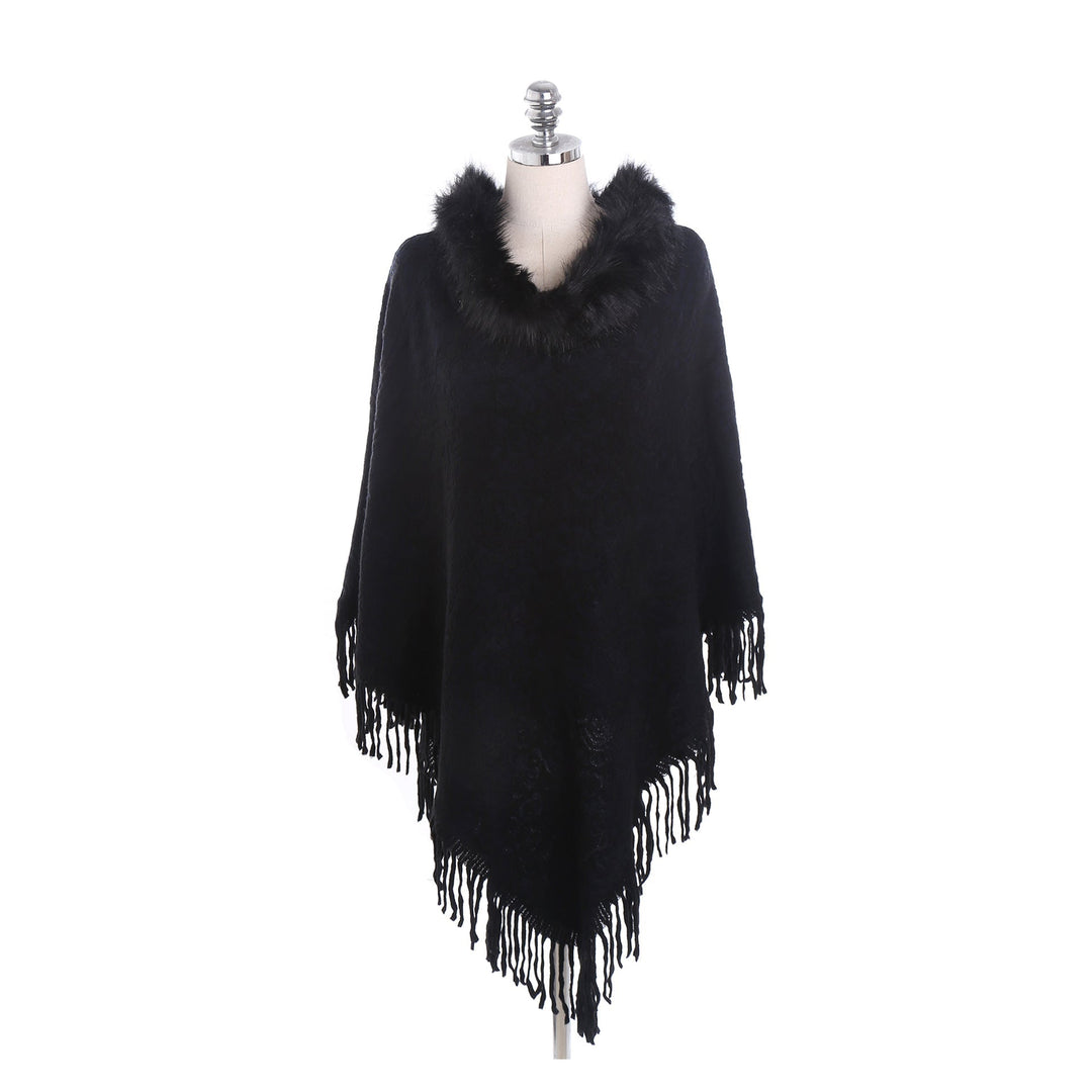 Dam poncho-Ruana med fuskpälskrage, structured jacquard och fransfåll