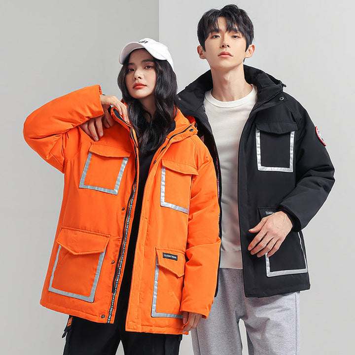 Dam parka jacka med huva, vadderad, reflective detaljer och stor cargo fickor