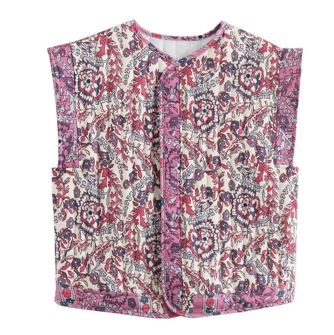 Dam quiltad väst med blommig design och praktiska fickor
