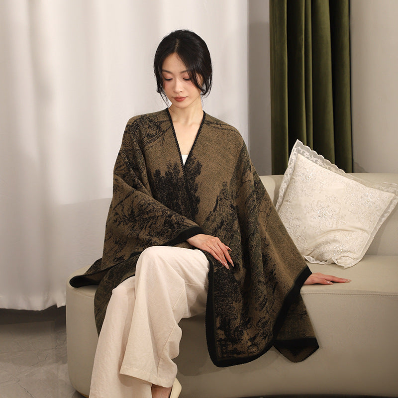 Dam jacquard stickad cape med textured woven look och öppen front