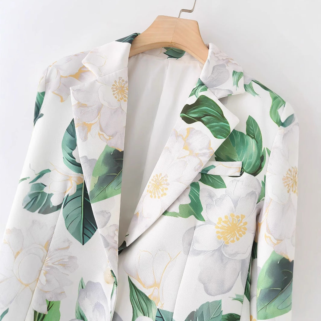 Dam floral printed lång blazer med lapel krage och welt fickor