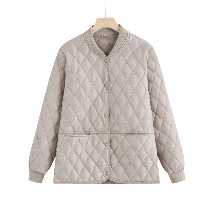Dam quiltad övergångsjacka med diamond stitching och ribbed krage