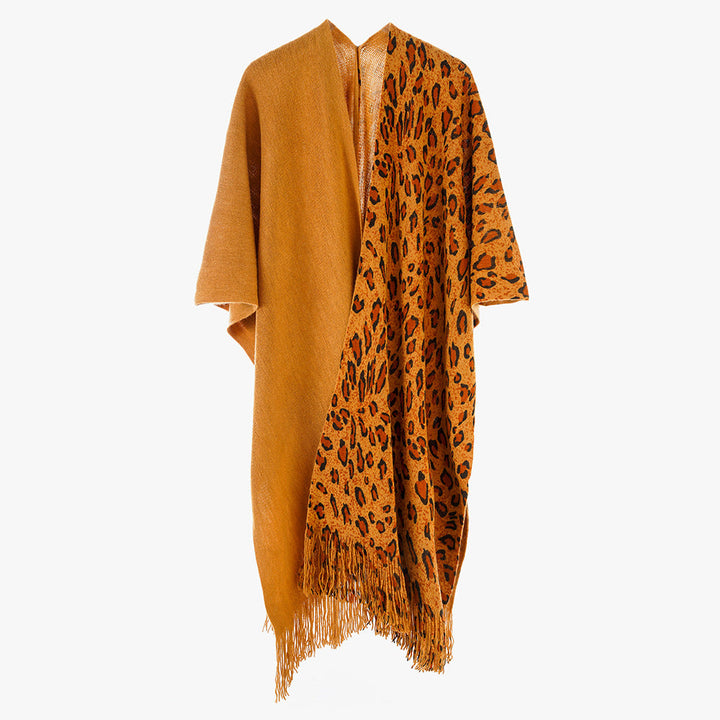 Dam Reversible capeponcho med Leo Jacquard, Fringes och Boxy oversized skärning