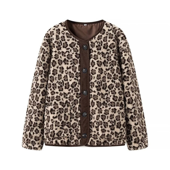 Dam faux sheepskin jacka med leopard mönster, manchester kant, full knäppning, och påsydda fickor