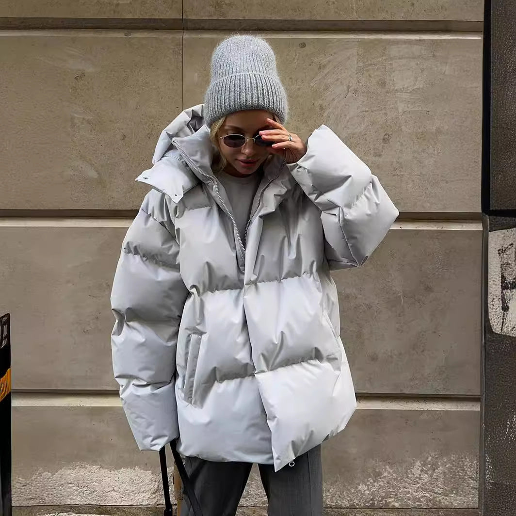 Dam oversize kviltad jacka med huva och vadderad värmande fyllning