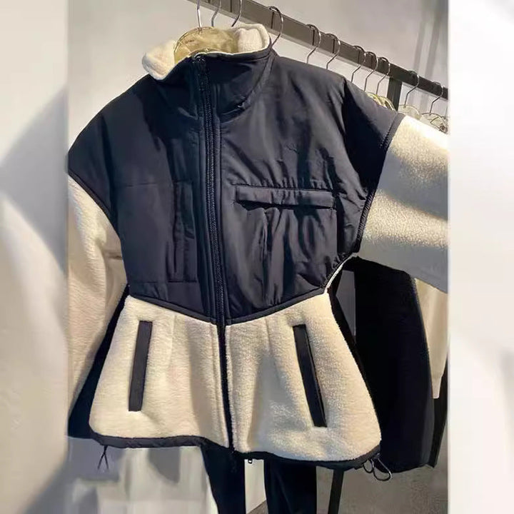 Dam hybrid fleecejacka med vadderad top, ståkrage och skräddad peplum