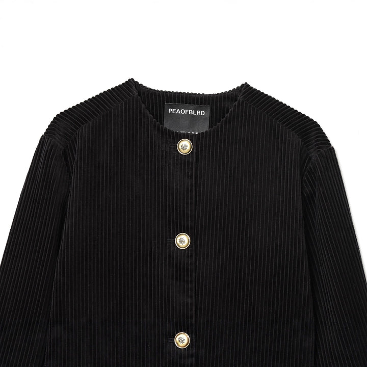 Dam manchester jacka kort med fine bred manchester structure, round neckline och golden decorative knappar