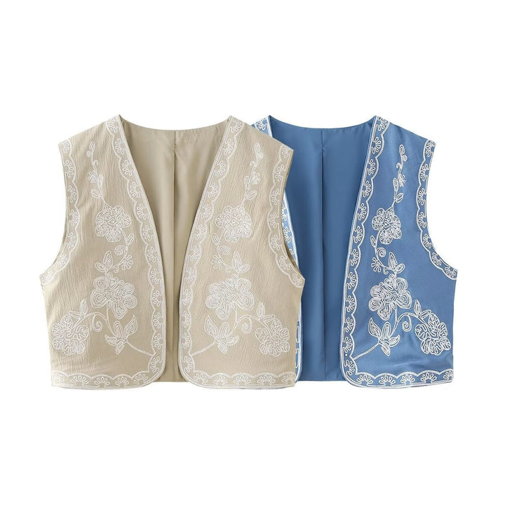 Dam embroidered kort väst med floral embroidery, öppen front och fine fåll decoration
