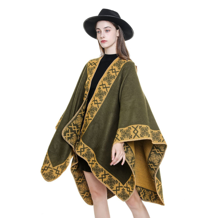 Dam oversized poncho cape tillverkad av ullblandning med woven border jacquard och decorative chain stitch