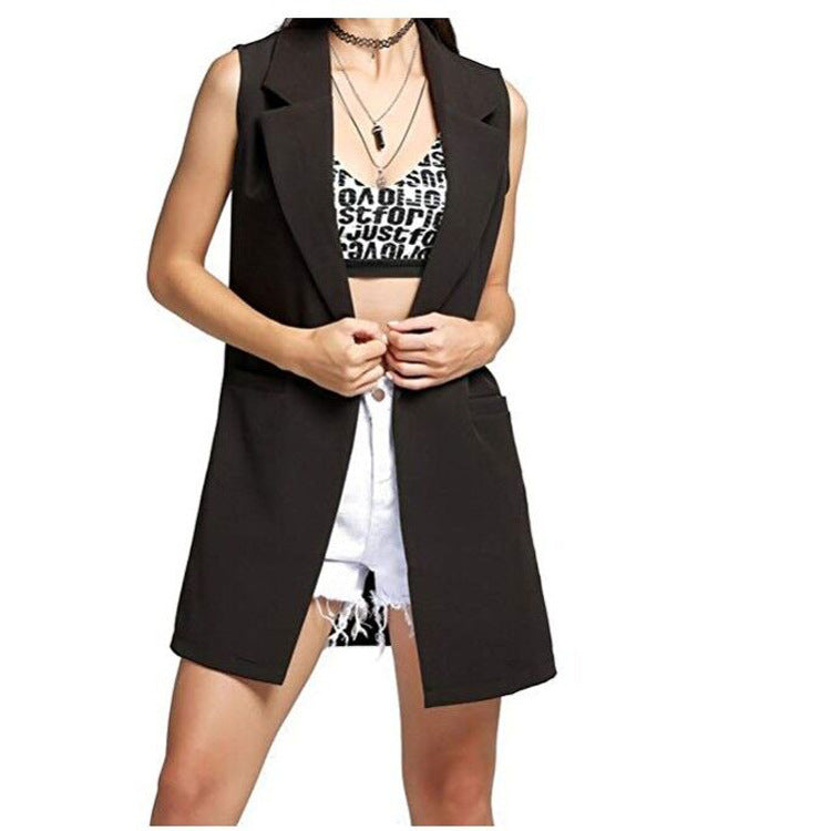 Dam lång waistcoat in tailoring look med shawl krage och sidofickor