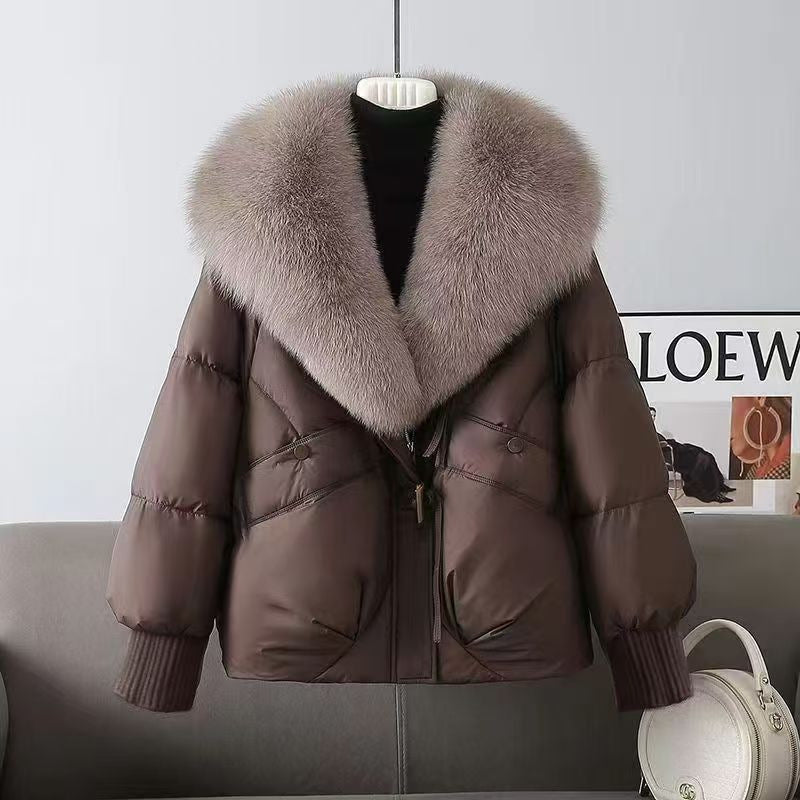 Dam kort vadderad jacka med luxurious faux fur krage och skräddad dragsko
