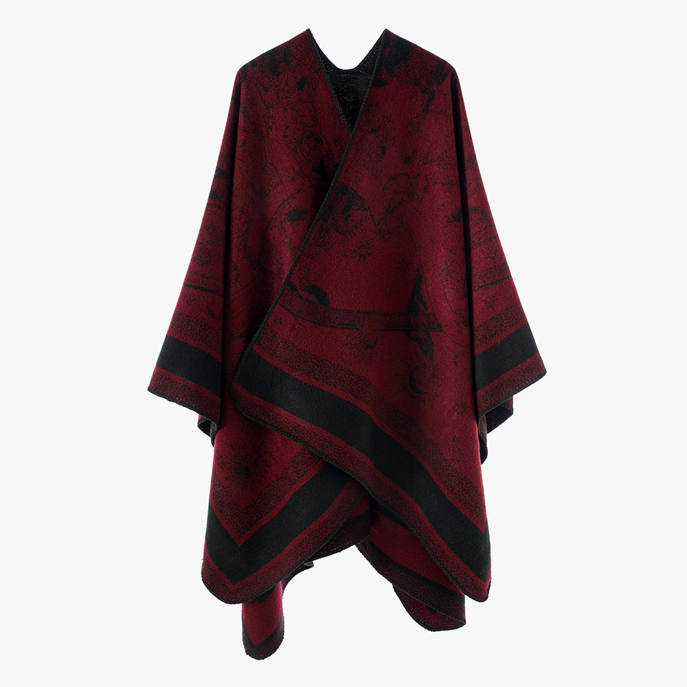 Dam Oversize Jacquard capeponcho tillverkad av ullblandning med V-neck och heavenly motif
