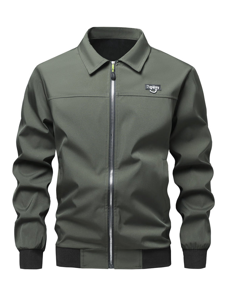 Herr Collar-Zip Blouson Tillverkad av Softshell med Ribbad Muddar och Smiley Patch