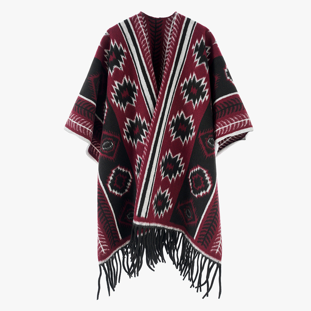 Dam Aztec-inspired fringe poncho cape i oversized rectangular skärning