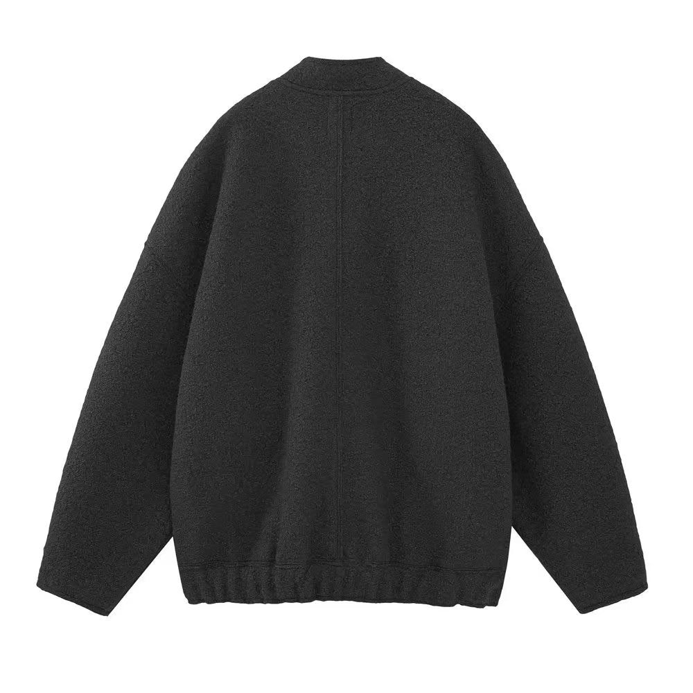 Dam kort boxy jacka i ullblandning med kort ståkrage, concealed front placket och påsydda fickor
