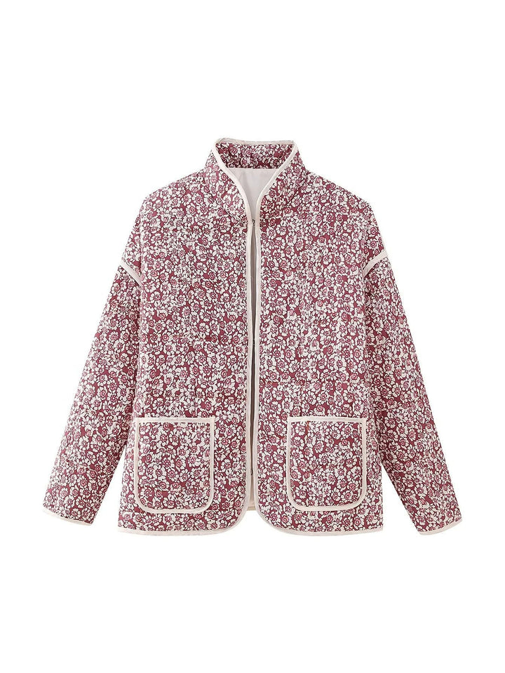 Dam quiltad floral jacka med ståkrage, dragkedja, och påsydda fickor