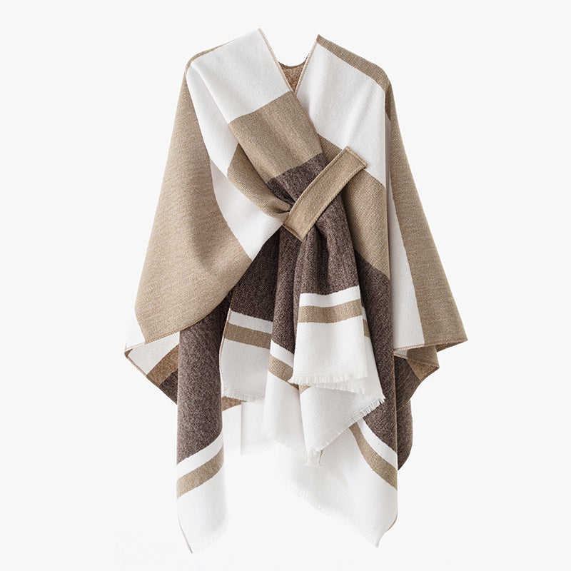 Dam oversized capeponcho tillverkad av ullblandning med tie loop och randig border