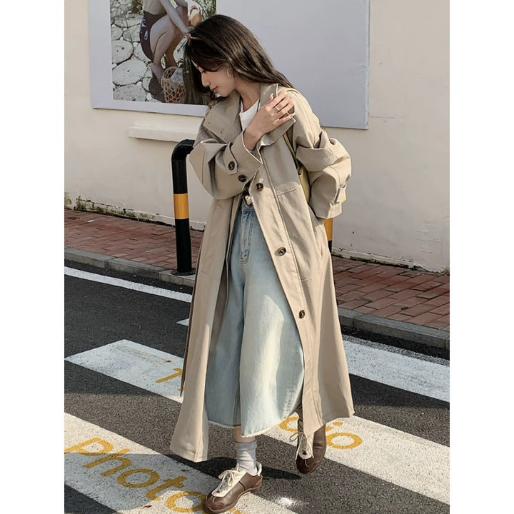 Dam längre lighter trenchcoat in oversize stil med straight skärning och dold knappslå