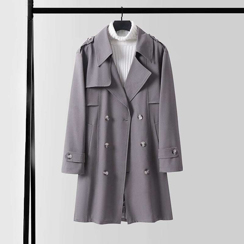Dam Double-breasted kort trenchcoat gjord lätt ullblandning med a mjuk drape och shoulder flaps