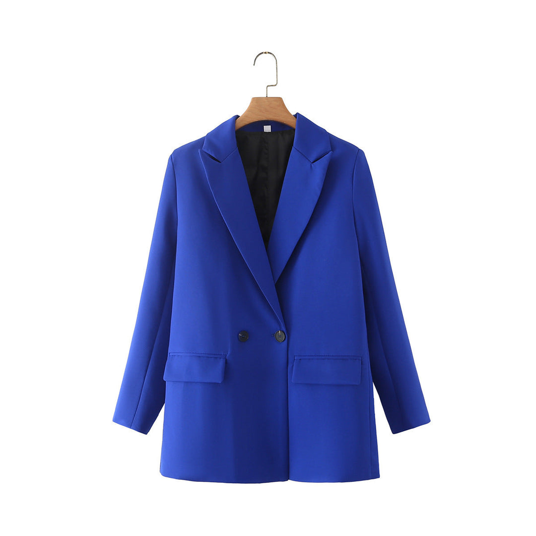 Dam figursydd lång blazer i oversized look med lapel krage och påsydda fickor