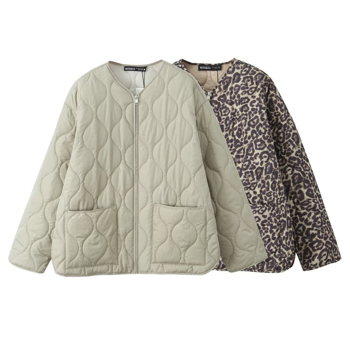 Dam vadderad oversize quiltad jacka med round neckline, hel dragkedja och two påsydda fickor