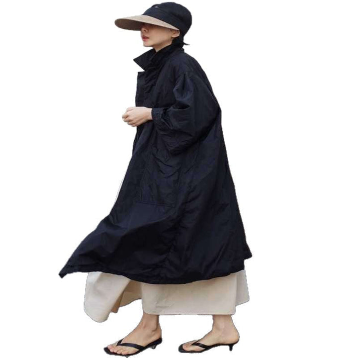 Dam Longline Parka i lätt vindjacka stil med innerfoder, drawstring och flap fickor