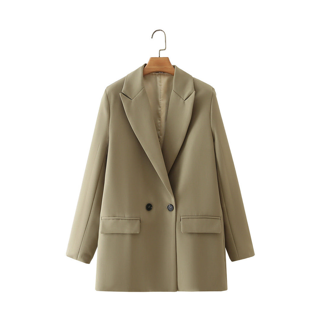 Dam figursydd lång blazer i oversized look med lapel krage och påsydda fickor