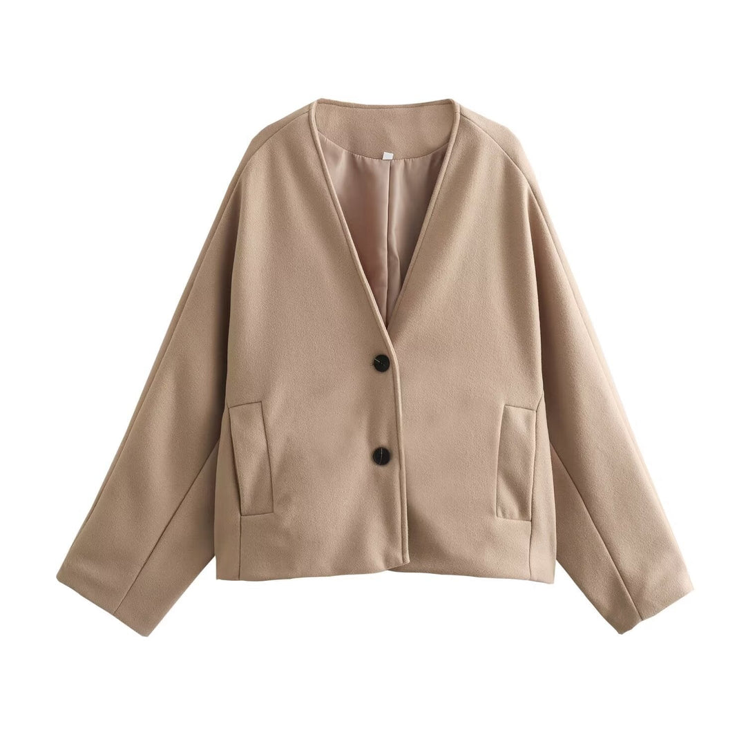 Dam kort kappa gjord ullblandning med oversize silhuett, V-ringning och double knapp stängning