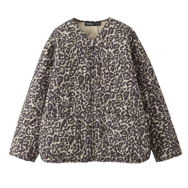 Dam vadderad oversize quiltad jacka med round neckline, hel dragkedja och two påsydda fickor