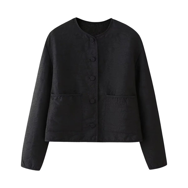 Dam quiltad kort jacka med crew neck, concealed snap knäppning och påsydda fickor