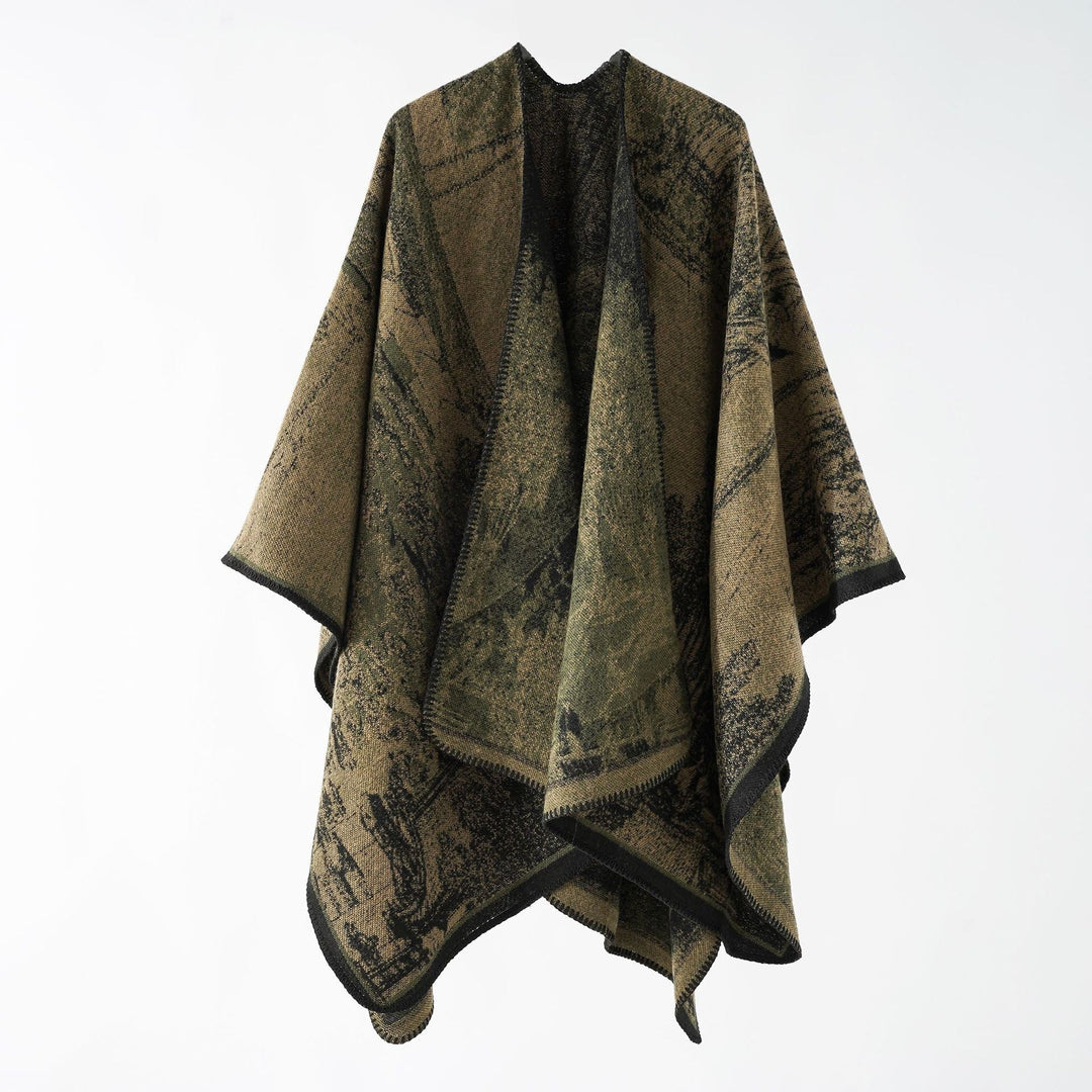 Dam jacquard stickad cape med textured woven look och öppen front