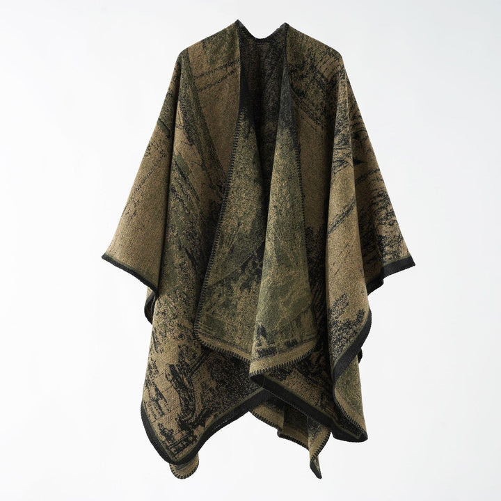 Dam jacquard stickad cape med textured woven look och öppen front